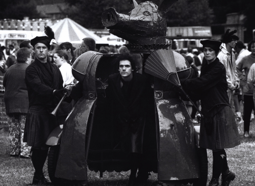 A black and white image of a large statue of a pig